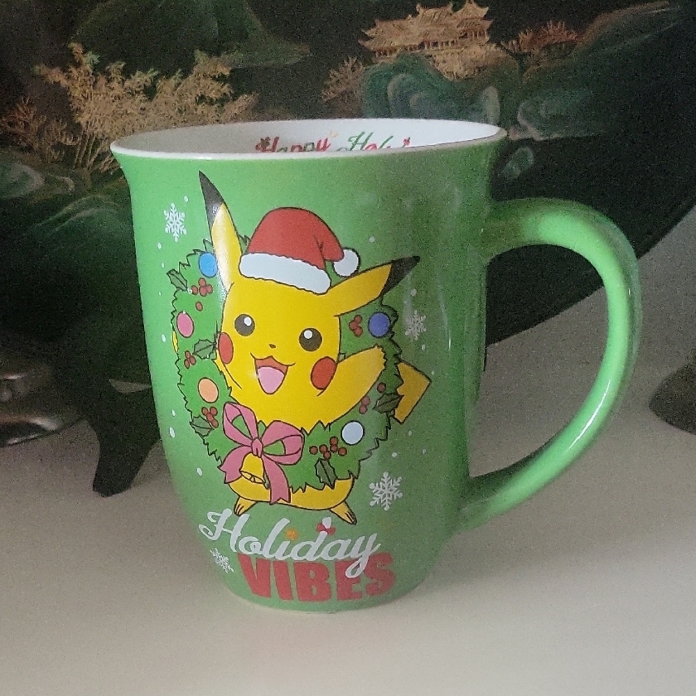 Green and Red Holiday Coffee Mug with Festive Decor